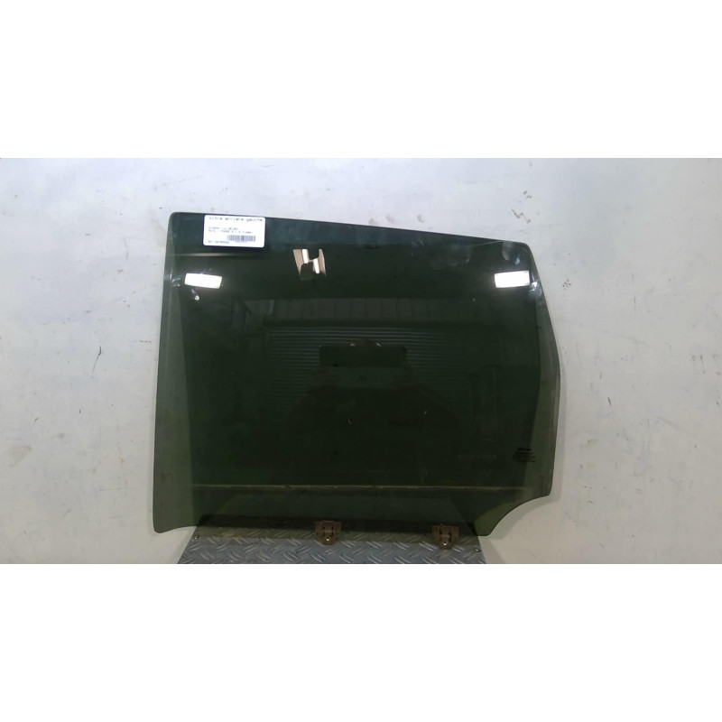 Vitre arriere gauche NISSAN NOTE 1 Photo n°1