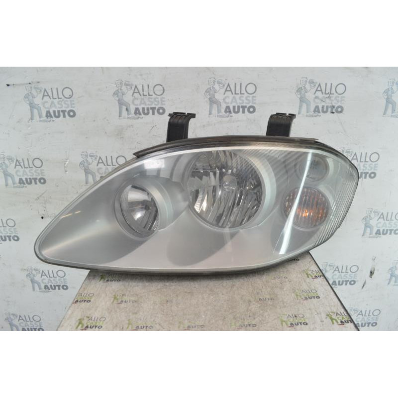 Optique avant principal gauche (feux)(phare) SSANGYONG STAVIC Photo n°1